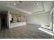 Open-concept living space with recessed lighting and wood-look flooring at 18043 Hillsborough Blvd, Port Charlotte, FL 33954