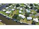 Aerial view of a waterfront community with boat docks and waterways at 19 Oakwood Dr N # 19, Englewood, FL 34223