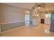 Open dining area features granite counters and cabinets at 19 Oakwood Dr N # 19, Englewood, FL 34223