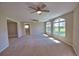 Bright living room featuring large windows at 19 Oakwood Dr N # 19, Englewood, FL 34223