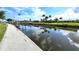 Beautiful waterfront property with boat dock and canal views, ideal for boating and relaxation at 19 Oakwood Dr N # 19, Englewood, FL 34223