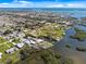Community aerial view highlighting waterfront properties, waterways, and the surrounding neighborhood at 2060 Oyster Creek Dr, Englewood, FL 34224