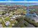 Aerial view of waterfront community with canal access at 2060 Oyster Creek Dr, Englewood, FL 34224