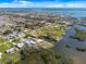 Waterfront home with boat access and coastal waterway views, set amidst a vibrant community at 2060 Oyster Creek Dr, Englewood, FL 34224