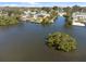 Waterfront community aerial view showcasing waterfront homes, docks, and scenic waterways at 2060 Oyster Creek Dr, Englewood, FL 34224