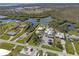 Waterfront home boasts boat access, with lush surroundings conveniently located near recreational fields at 2060 Oyster Creek Dr, Englewood, FL 34224