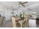 Bright dining area with an open layout and access to outdoor living space, perfect for entertaining at 2060 Oyster Creek Dr, Englewood, FL 34224
