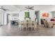 Elegant dining room with stylish furniture, an open floor plan, and plenty of natural light at 2060 Oyster Creek Dr, Englewood, FL 34224