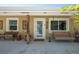 Cozy porch with seating and a swing, perfect for relaxing and enjoying the outdoors at 2060 Oyster Creek Dr, Englewood, FL 34224