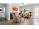 Cozy living room with comfortable seating, bright natural light, and warm decor at 2060 Oyster Creek Dr, Englewood, FL 34224
