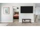 Bright living room with views into the main bedroom and kitchen area, featuring stylish decor at 2060 Oyster Creek Dr, Englewood, FL 34224