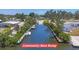 Scenic view of the community boat ramp with boats docked, offering waterfront access and recreation at 2117 Michigan Ave, Englewood, FL 34224
