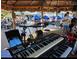 Live band playing outdoors with a lively crowd, umbrellas, and waterfront views at 2117 Michigan Ave, Englewood, FL 34224