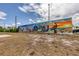 Greetings from Englewood mural featuring local landmarks and coastal scenery at 2117 Michigan Ave, Englewood, FL 34224