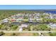 Aerial view of a waterfront community with canal access for boating enthusiasts at 2441 Vance Ter, Port Charlotte, FL 33981