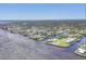 Aerial view of homes along canals and waterfront properties and the community at 2441 Vance Ter, Port Charlotte, FL 33981