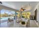 Relaxing covered patio with outdoor furniture overlooking the pool area is perfect for entertaining guests at 2441 Vance Ter, Port Charlotte, FL 33981