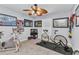 Exercise room with stationary bikes, cycling bike, and medal display at 2678 Alva St, North Port, FL 34291