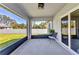 Enclosed patio with backyard view at 2678 Alva St, North Port, FL 34291