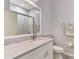 Clean bathroom with a white vanity and mirror at 2692 Wax Myrtle Ct, Port Charlotte, FL 33953