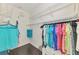 Spacious walk-in closet with ample shelving and hanging space for organized storage at 2692 Wax Myrtle Ct, Port Charlotte, FL 33953