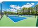 Community pickleball courts surrounded by lush greenery, perfect for active residents at 2692 Wax Myrtle Ct, Port Charlotte, FL 33953