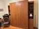 Bedroom with a Murphy bed and plenty of built in storage and shelving at 2864 Traverse Ave, North Port, FL 34286