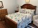 Comfortable bedroom with a bed, wooden furniture, and warm lighting at 2864 Traverse Ave, North Port, FL 34286