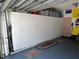 Garage featuring ample storage cabinets, offering great organizational space at 2864 Traverse Ave, North Port, FL 34286