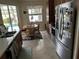 Well-lit kitchen nook with a view of the pool, stainless steel appliances and wood cabinets at 2864 Traverse Ave, North Port, FL 34286