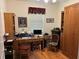 Office space with a window, wooden desk, chair, and built in cabinets at 2864 Traverse Ave, North Port, FL 34286
