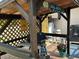 Outdoor grilling area with brick patio featuring a grill and wooden structure at 2864 Traverse Ave, North Port, FL 34286
