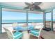 Beachfront screened-in porch features ample seating and gorgeous ocean views for ultimate relaxation at 301 S Gulf Blvd # 3, Placida, FL 33946
