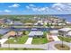 Scenic aerial view of a waterfront community showcasing homes with boat docks and easy access to the river at 3025 Curry Ter, Port Charlotte, FL 33981