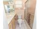 Traditional bathroom with a shower, vanity, and toilet offering a functional and clean space at 407 Park S Blvd, Venice, FL 34285
