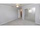 This bedroom features neutral walls, carpet, a ceiling fan, and mirrored closet doors at 407 Park S Blvd, Venice, FL 34285