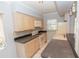Functional kitchen features appliances and ample counter space, ensuring a practical cooking environment at 407 Park S Blvd, Venice, FL 34285