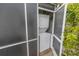 Exterior laundry area with a stacked washer and dryer, for added convenience at 407 Park S Blvd, Venice, FL 34285