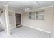 Enclosed and breezy outdoor patio featuring tile flooring and ceiling fan for relaxed, comfortable outdoor living at 407 Park S Blvd, Venice, FL 34285