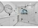 Updated bathroom featuring quartz countertops, modern vanity and glass enclosed shower at 4210 Day St, Port Charlotte, FL 33948