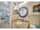 Stylish bathroom features granite counters at 4510 Burns Ter, Port Charlotte, FL 33981