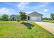 Charming single-story home with a well-maintained lawn, two-car garage and inviting curb appeal at 4510 Burns Ter, Port Charlotte, FL 33981