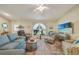 Comfortable living room featuring bright interiors, tile flooring, and ample natural light at 4510 Burns Ter, Port Charlotte, FL 33981