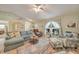 Inviting living room featuring comfortable seating, neutral color palette, and lots of natural light at 4510 Burns Ter, Port Charlotte, FL 33981