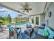 Beautiful screened-in pool with a covered lanai, seating, and access to the outdoors at 4510 Burns Ter, Port Charlotte, FL 33981