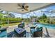 Inviting screened-in pool area with comfortable lounge seating and a beautiful outdoor view at 4510 Burns Ter, Port Charlotte, FL 33981