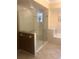 Bright bathroom featuring a glass-enclosed shower and a soaking tub for a spa-like experience at 4612 Club Dr # D102, Port Charlotte, FL 33953