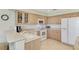 Kitchen with ample counter space and modern appliances providing a practical and functional cooking area at 4612 Club Dr # D102, Port Charlotte, FL 33953