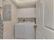 Laundry room featuring a side-by-side washer and dryer at 4612 Club Dr # D102, Port Charlotte, FL 33953