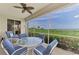 Outdoor patio with seating area and gorgeous lake views at 4612 Club Dr # D102, Port Charlotte, FL 33953